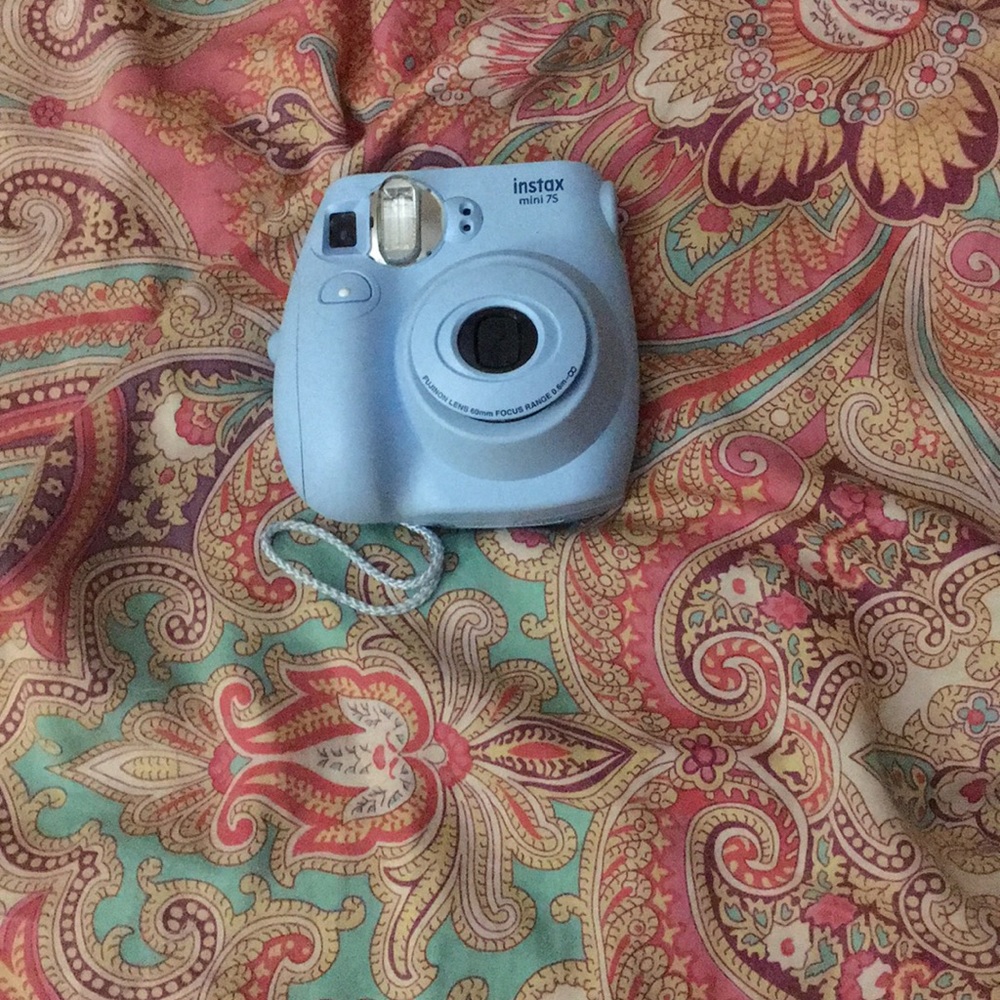 Polaroid is tax 7s very good shape